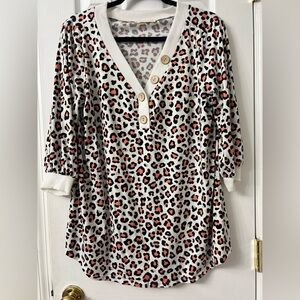 Reb in J leopard top XL